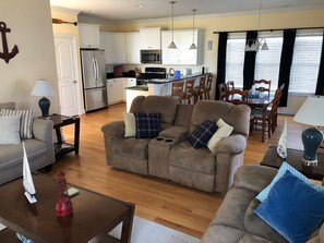 Flat-screen TV, DVD player, ping pong, books