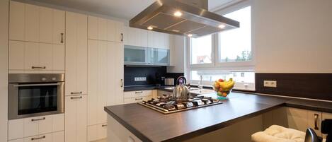 Penthouse exclusivo, varias camas, vista al valle | Cocina privada | Refrigerador con congelador, microondas y parrilla de estufa