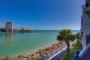 Enjoy breathtaking ocean views from the balcony overlooking the beach and sea.