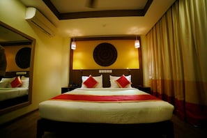 Deluxe Room, City View | Premium bedding, minibar, in-room safe, laptop workspace - Vivin Luxury Suites (Thiruvananthapuram)