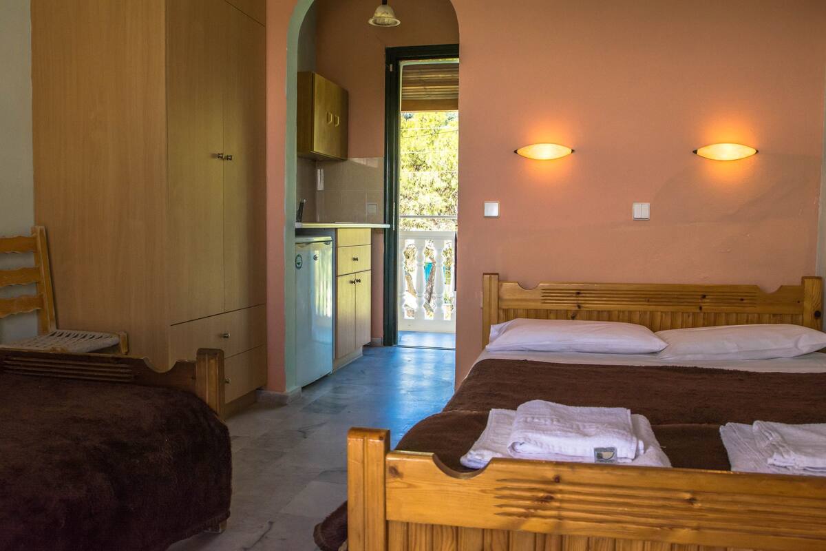 Standard Triple Room, Pool View | 1 bedroom, iron/ironing board, free cribs/infant beds, free WiFi