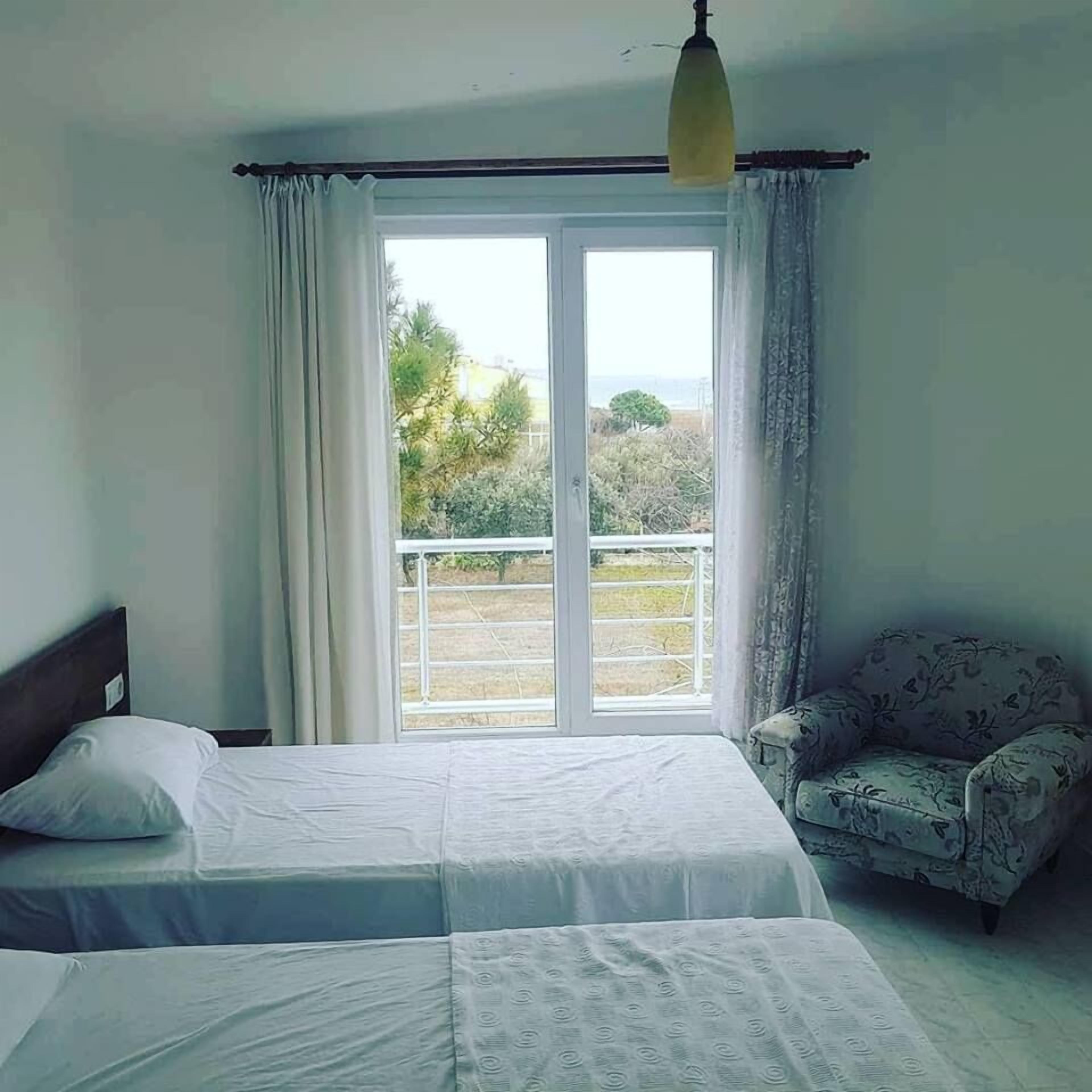 트윈룸, 공용 욕실, 바다 전망 | 무료 WiFi, 침대 시트