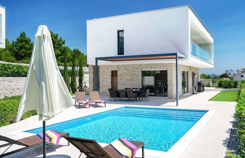 Villa Carrera- modern villa for 10 guests with a pool and hot-tub close to the beach by MyWaycation