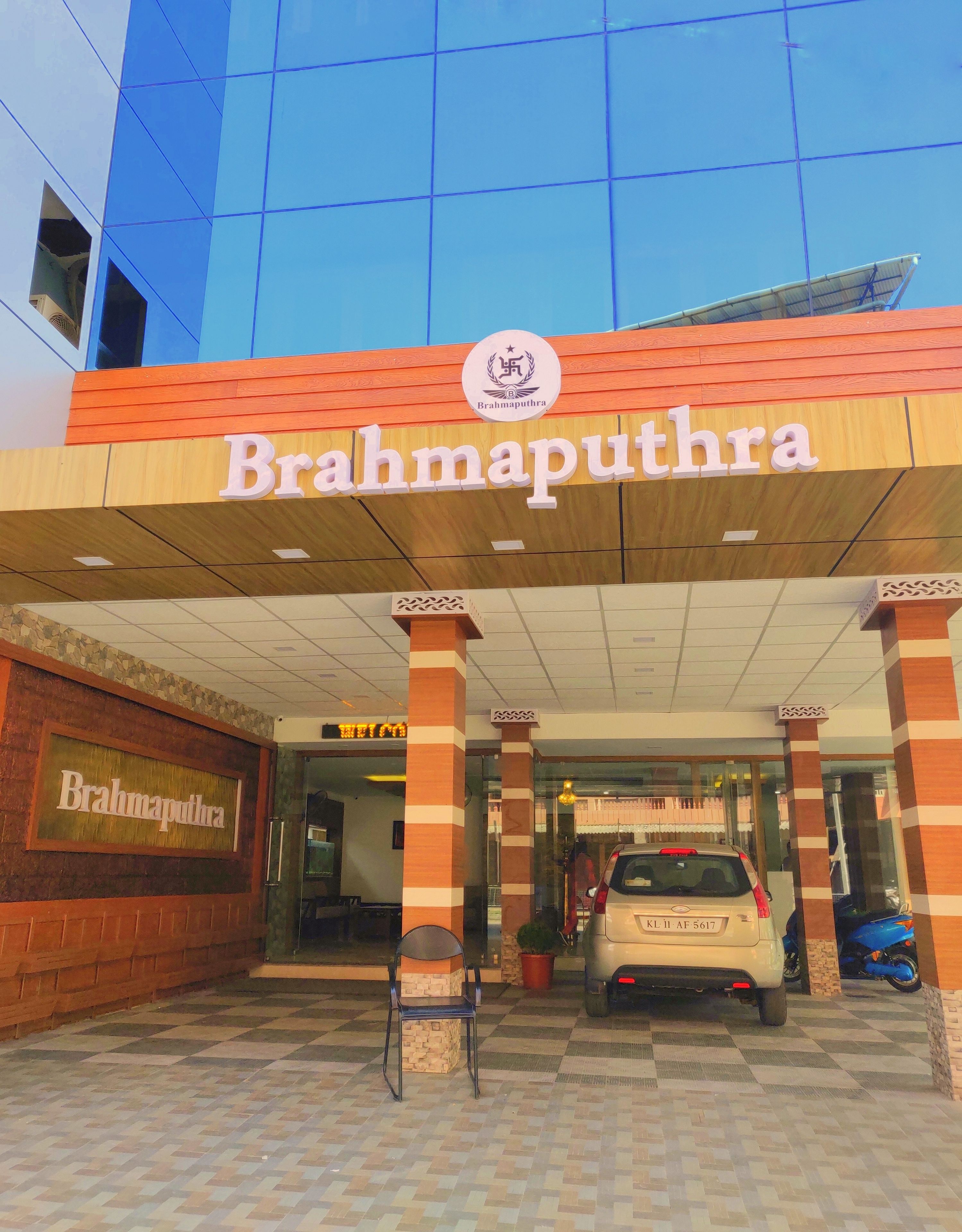 The entrance of a building with a sign reading "Brahmaputhra."