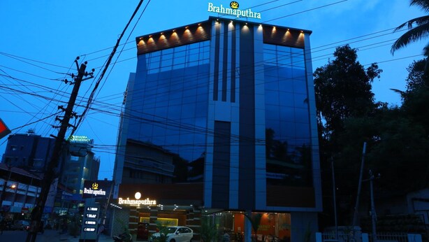 A modern building with a sign reading "Brahmaputhra" at the top. - Hotel Brahmaputhra (Chavakkad)