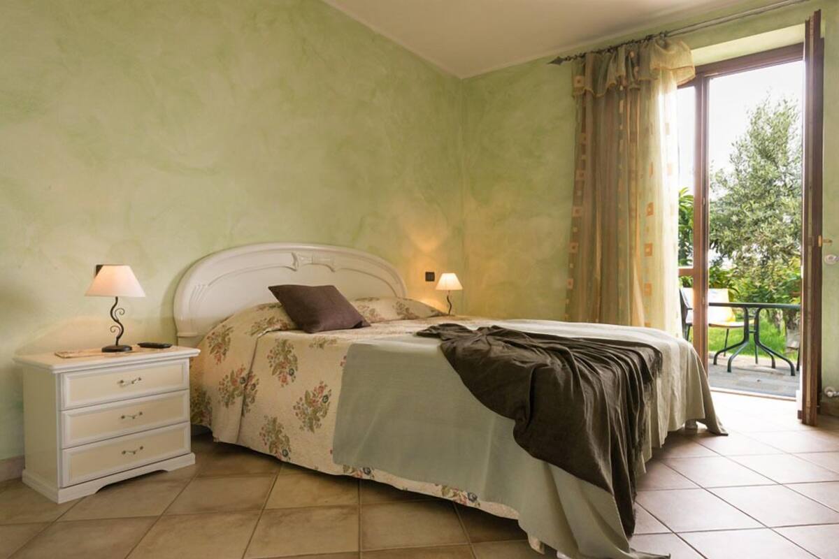 Double Room, 1 Queen Bed, Ground Floor (Mela) | 1 bedroom, desk, blackout drapes, iron/ironing board (on request)