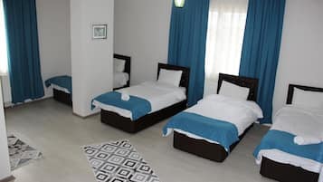 Kamar Quadruple | 1 kamar tidur, minibar, tirai kedap cahaya, dan kedap suara