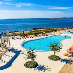 Seasonal outdoor pool, pool umbrellas, pool loungers