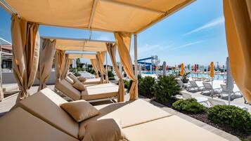 Seasonal outdoor pool, pool umbrellas, sun loungers