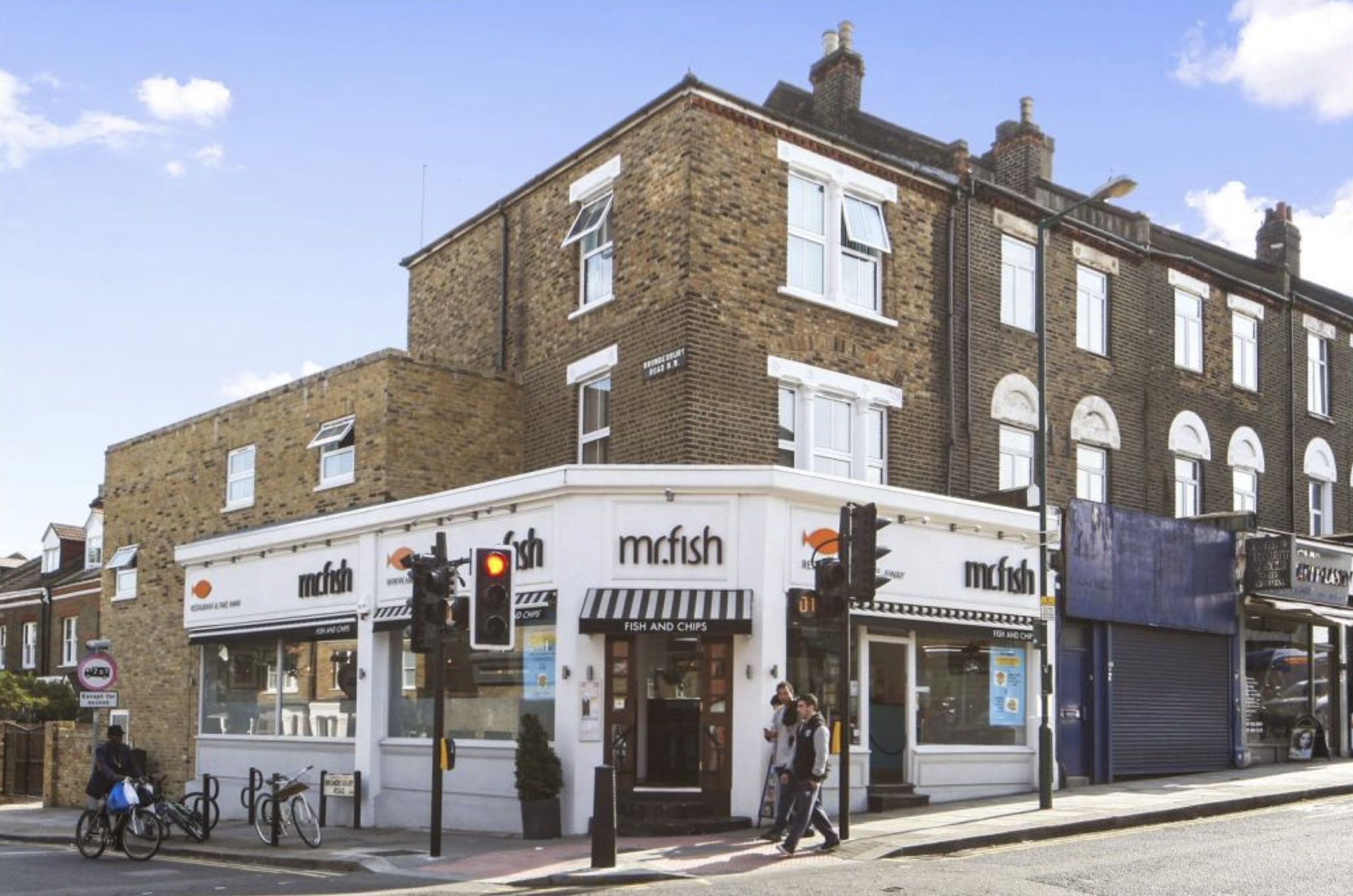 A corner building with a fish and chips shop named 'McFish'.