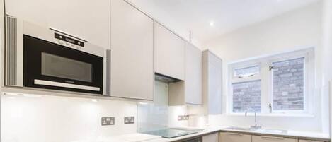 Apartment, 1 Double Bed with Sofa bed | Private kitchen | Fridge, microwave, stovetop, dishwasher