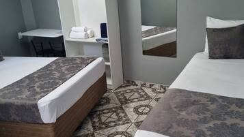 Triple Room, Multiple Beds | Desk, iron/ironing board, free WiFi, bed sheets