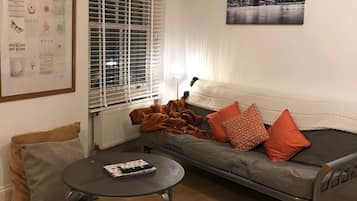 Apartamento, 1 cama de casal e sofá-cama | Área de estar