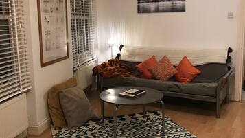 Apartamento, 1 cama de casal e sofá-cama | Área de estar