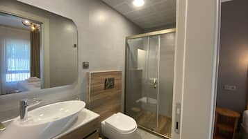 Standard Double Room | Bathroom | Shower, free toiletries, hair dryer, slippers