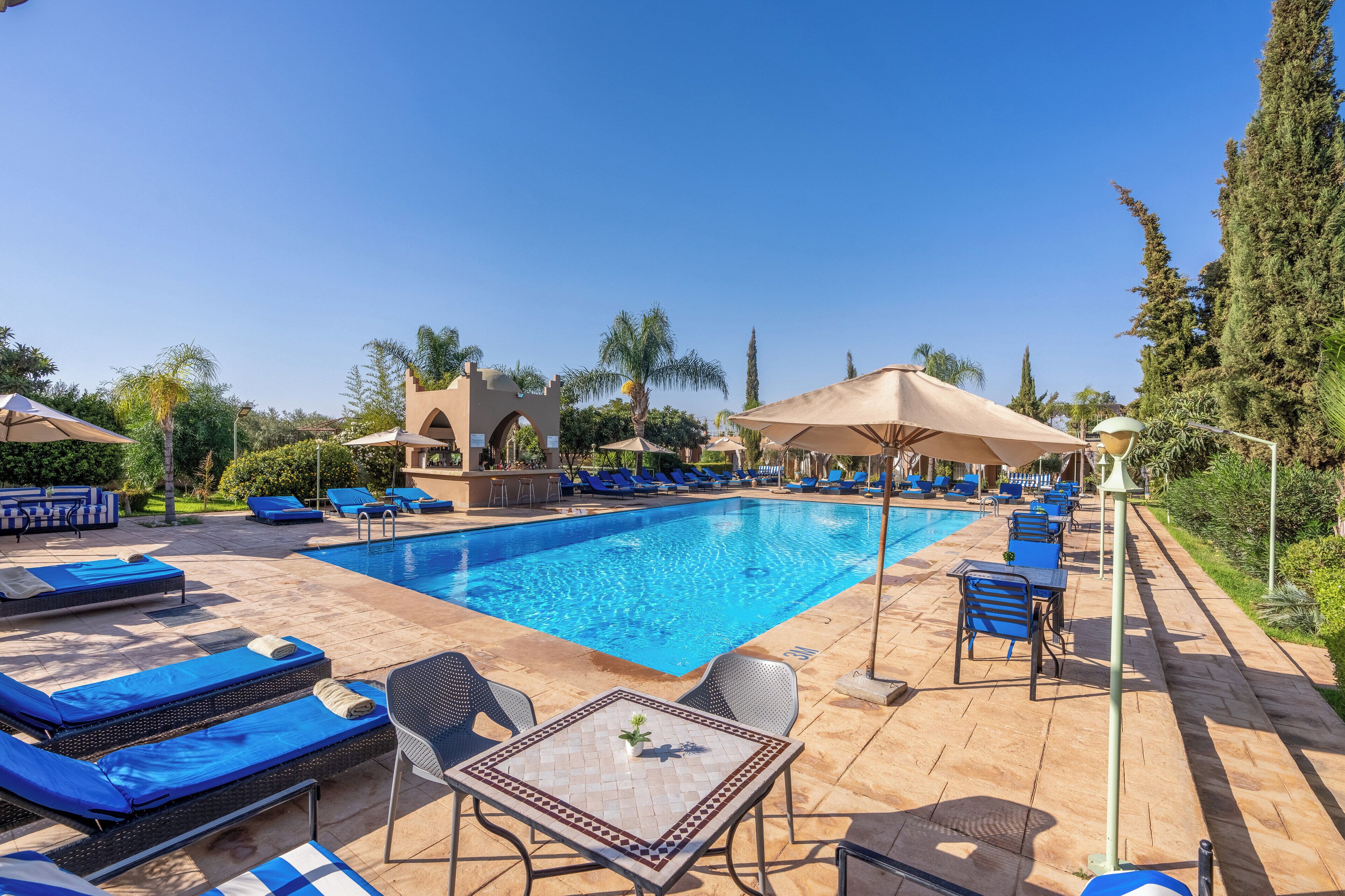 Outdoor pool, pool umbrellas, pool loungers