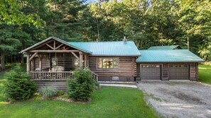 Exterior - Cedar Lane Cabin: Authentic log cabin in wooded setting overlooking rural farmland (Penn Yan)
