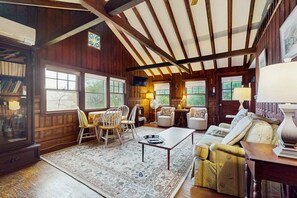 TV, fireplace, books