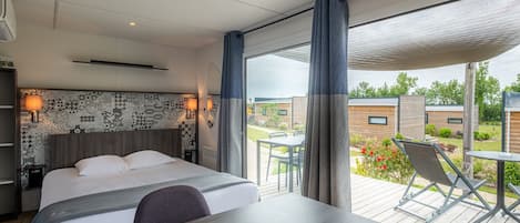 Monolocale | Area soggiorno | TV a schermo piatto