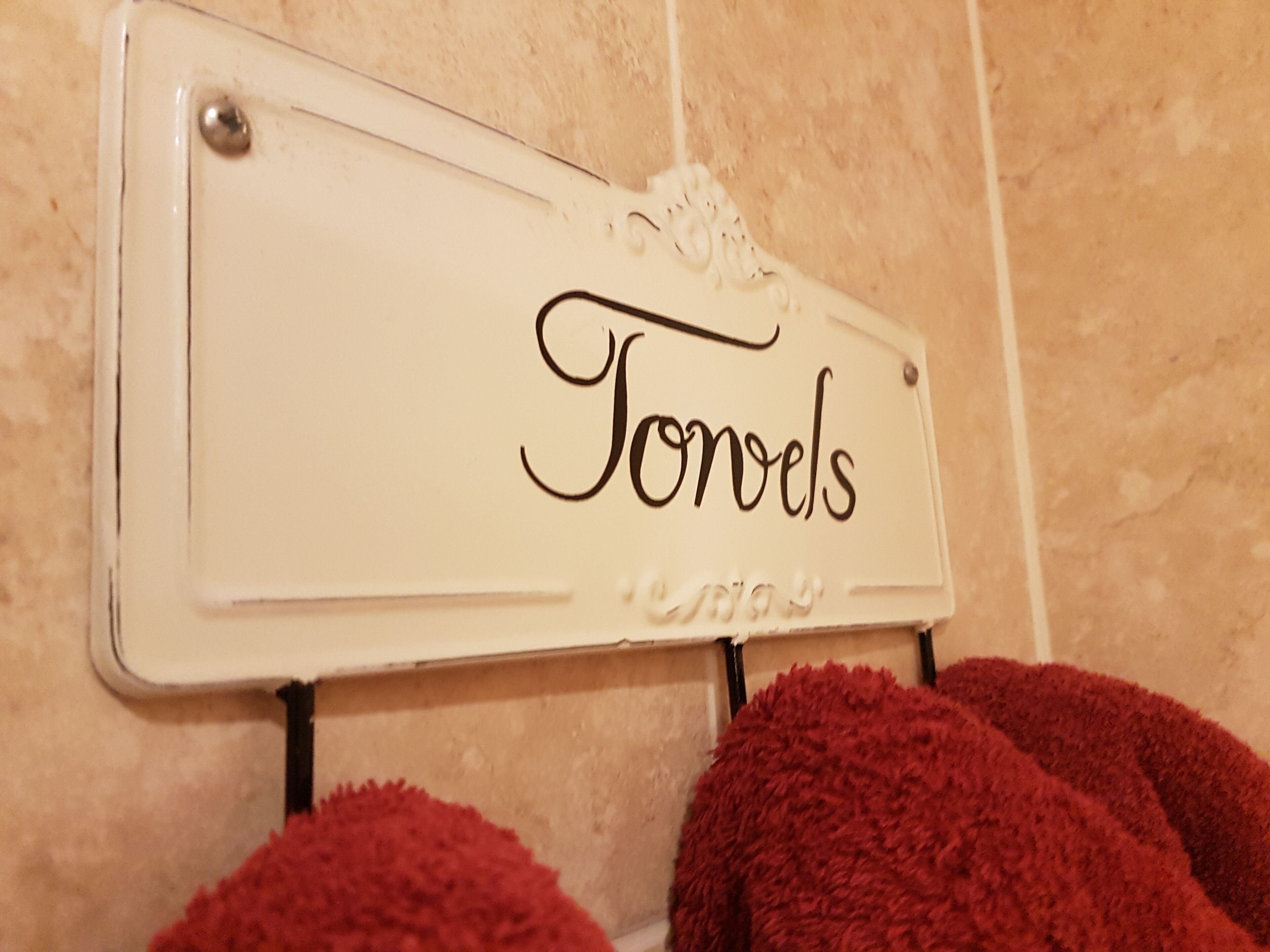 shower, hair dryer, heated floors, towels