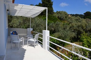 Comfort maisonnette, uitzicht op tuin | Balkon
