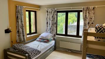 Premium Apartment, 2 Bedrooms, Jetted Tub, Lake View (Les Trois Lions) | Memory-foam beds, individually decorated, individually furnished