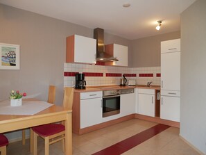 Fridge, oven, dishwasher, coffee/tea maker