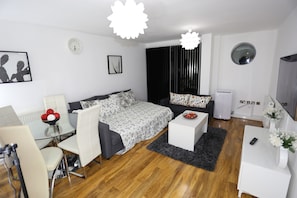 Apartment, 2 Bedrooms | Living area | Flat-screen TV