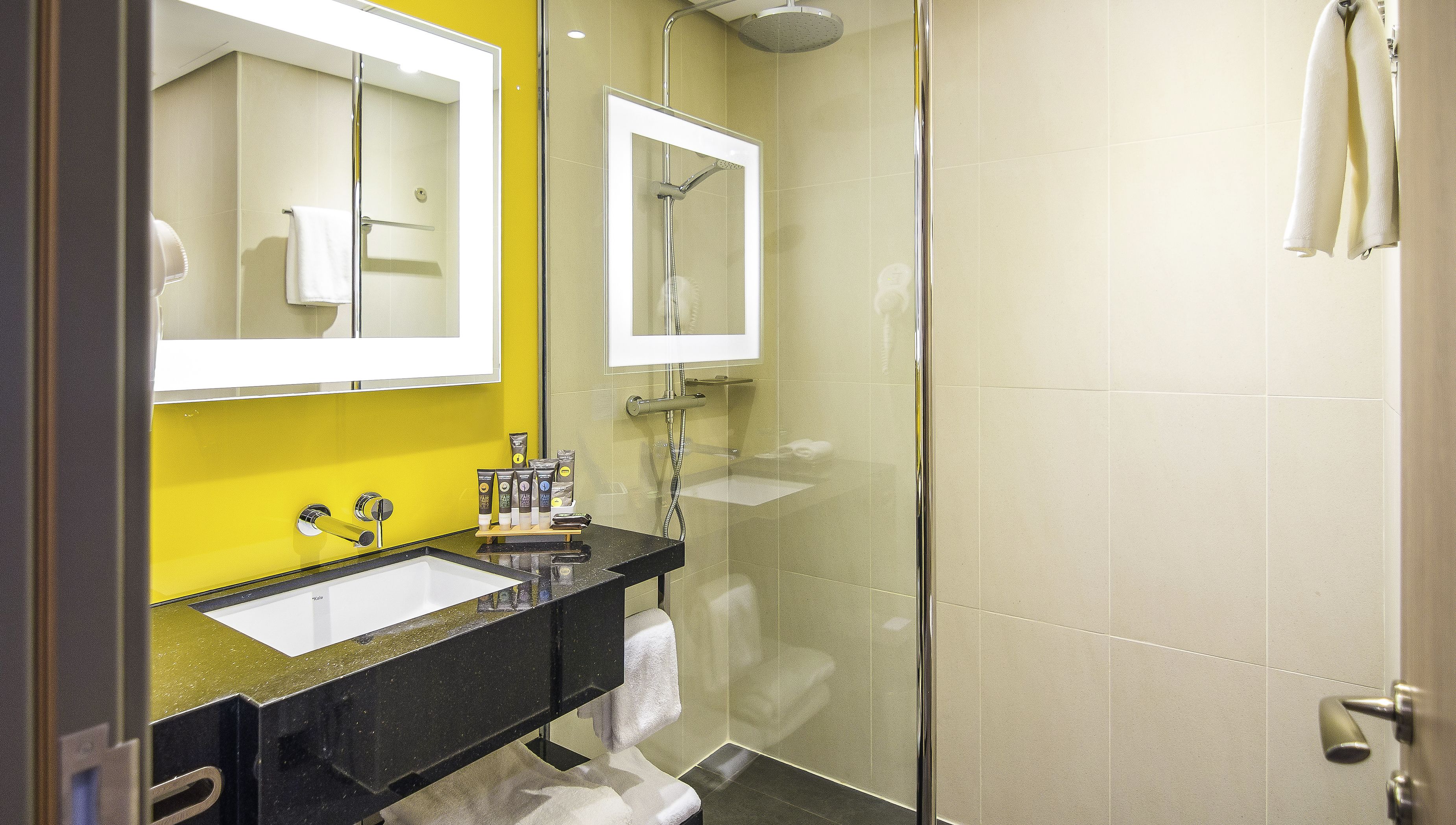 eco-friendly toiletries, hair dryer, bathrobes, slippers