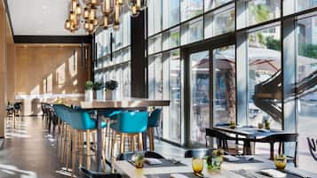 Breakfast, lunch, dinner served; pool views