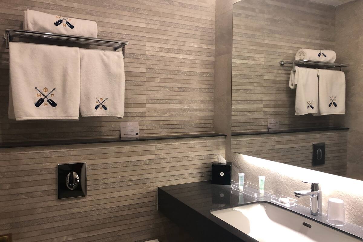 shower, rainfall showerhead, hair dryer, slippers