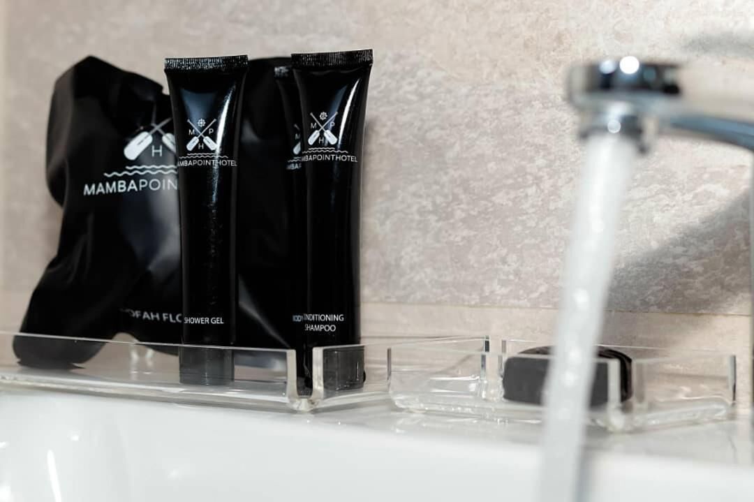 shower, rainfall showerhead, hair dryer, slippers