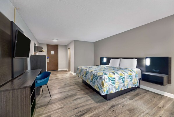 Premium bedding, desk, laptop workspace, blackout curtains