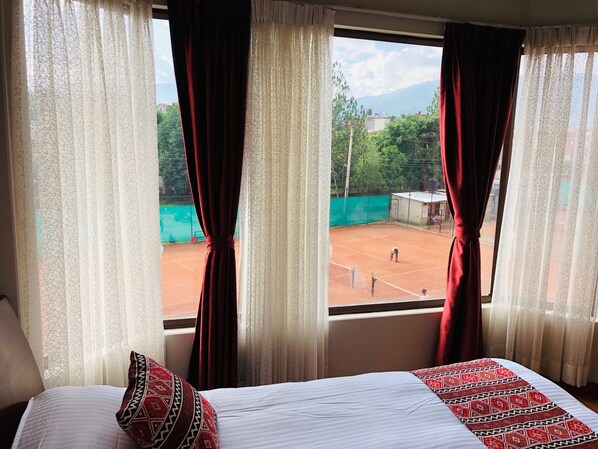 Habitación individual Premium, 1 habitación, vista al patio | 1 habitación y caja de seguridad en la habitación