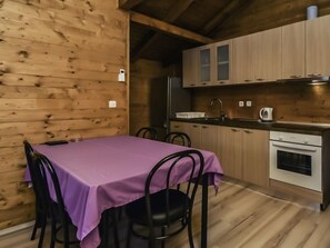 Fridge, oven, cookware/dishes/utensils, dining tables - Vacation home Palma by Interhome (Novigrad (Zadar))