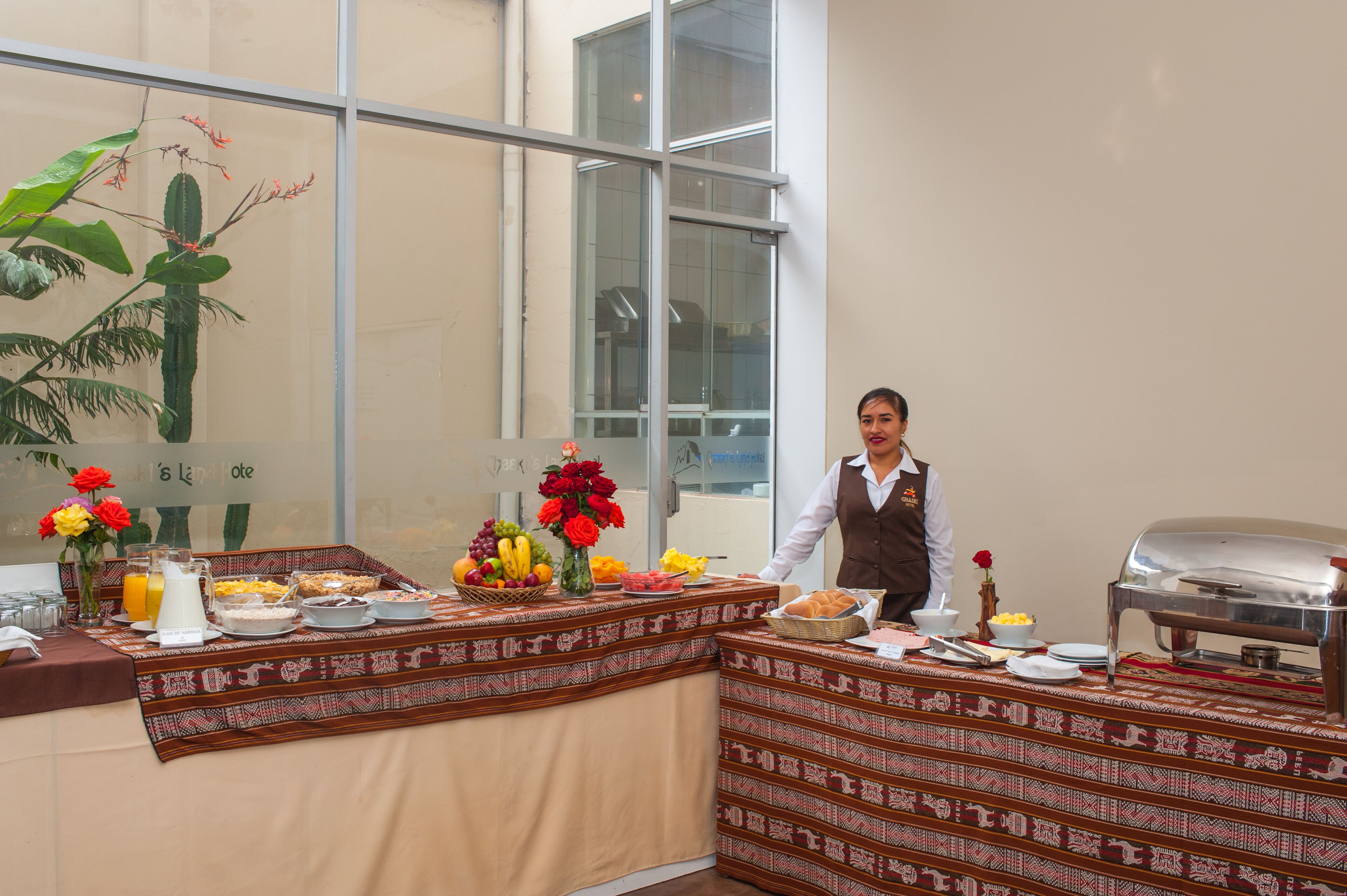 A buffet setup with a variety of food items and a buffet table.