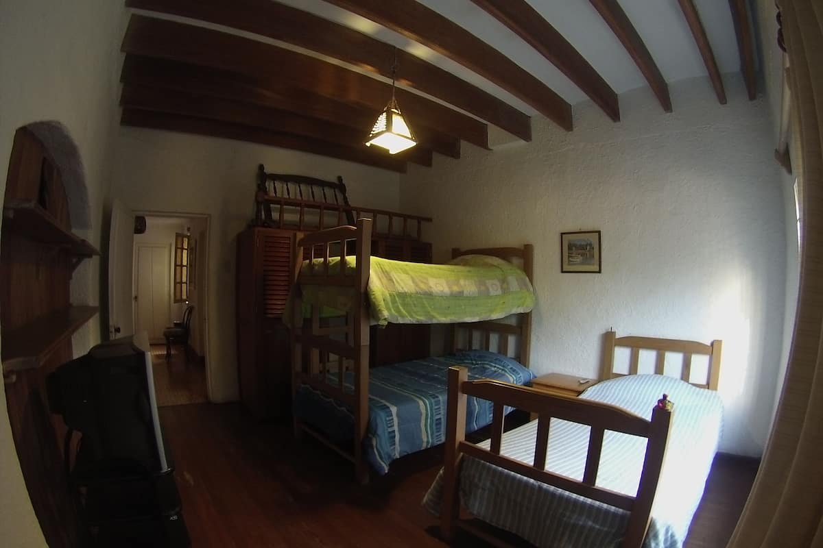 Family Triple Room, Shared Bathroom | Blackout curtains, iron/ironing board, free WiFi, bed sheets