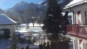 A snowy mountain landscape with a playground and buildings. - Kitz Residenz 6, Kaprun, Zell am See, Salzburg (Kaprun)