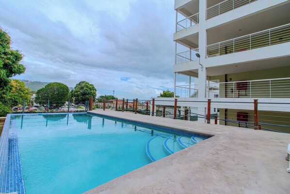 Outdoor pool - I Heart JA DreamCondo at The Bromptons (Kingston)