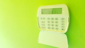 A calculator with a digital display on a green background. - I Heart JA Willow Garden Retreat-Mona (Kingston)