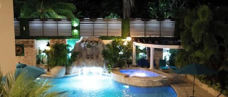 Outdoor pool, pool umbrellas, sun loungers
