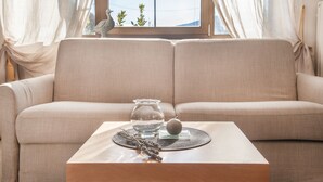 Smart TV, fireplace - apartment "AIA" holiday home - relax in an charming village (TENNO)