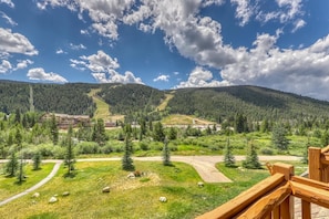 Enjoy breathtaking views of the surrounding landscape from the deck.
