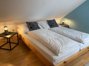 2 bedrooms, travel crib, WiFi, bed sheets