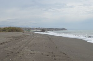 Plage, chaises longues