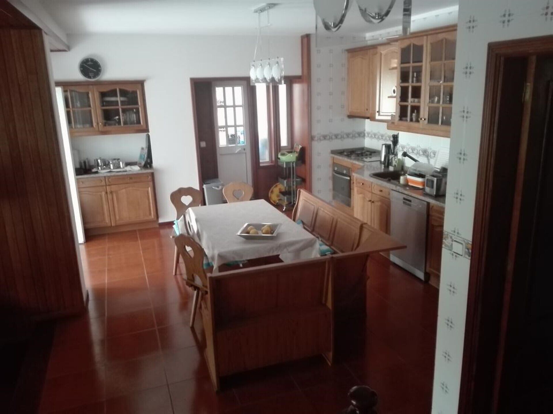 Kitchen and exit to the garden and river outside 
