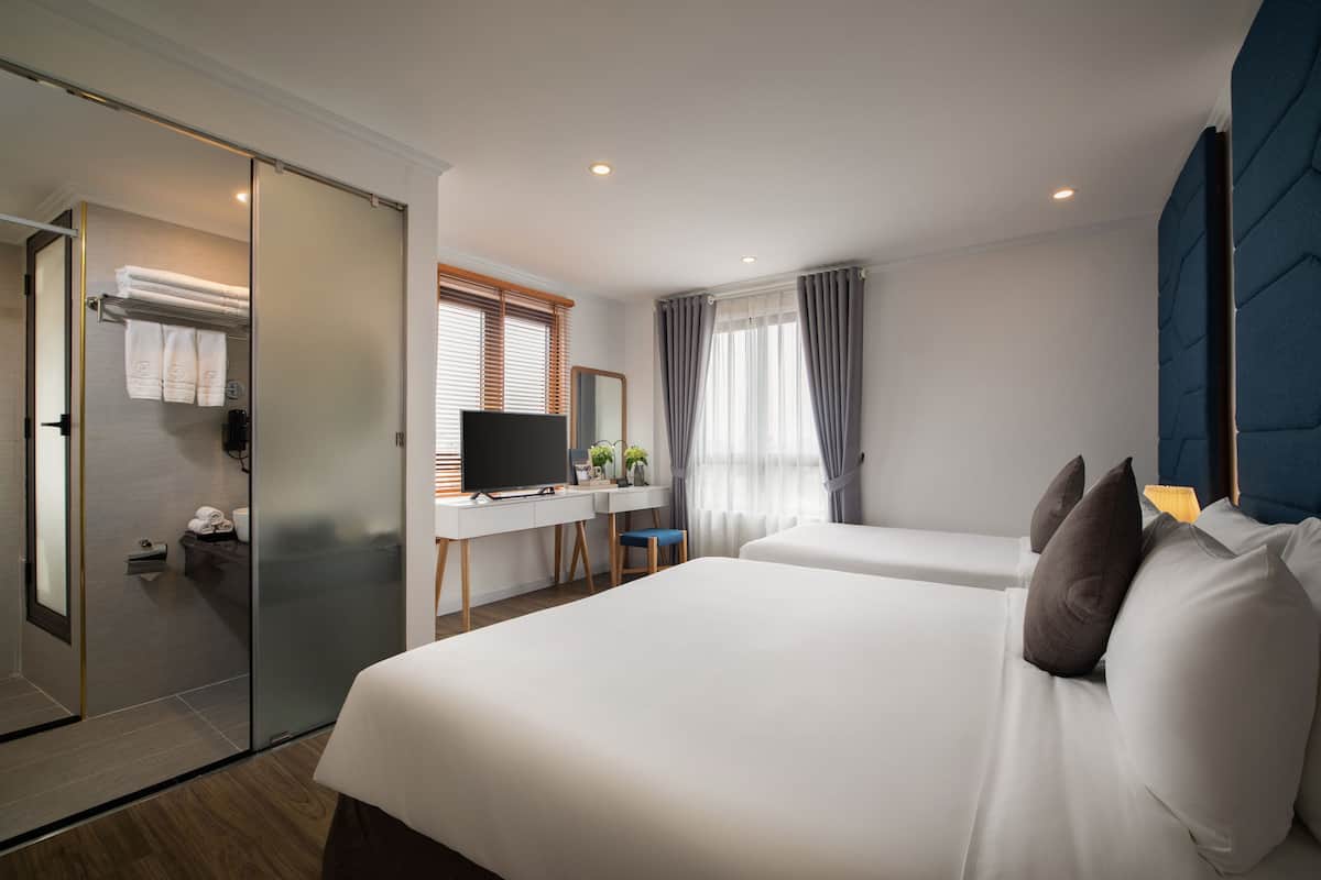 Family Room, City View | Premium bedding, minibar, in-room safe, desk