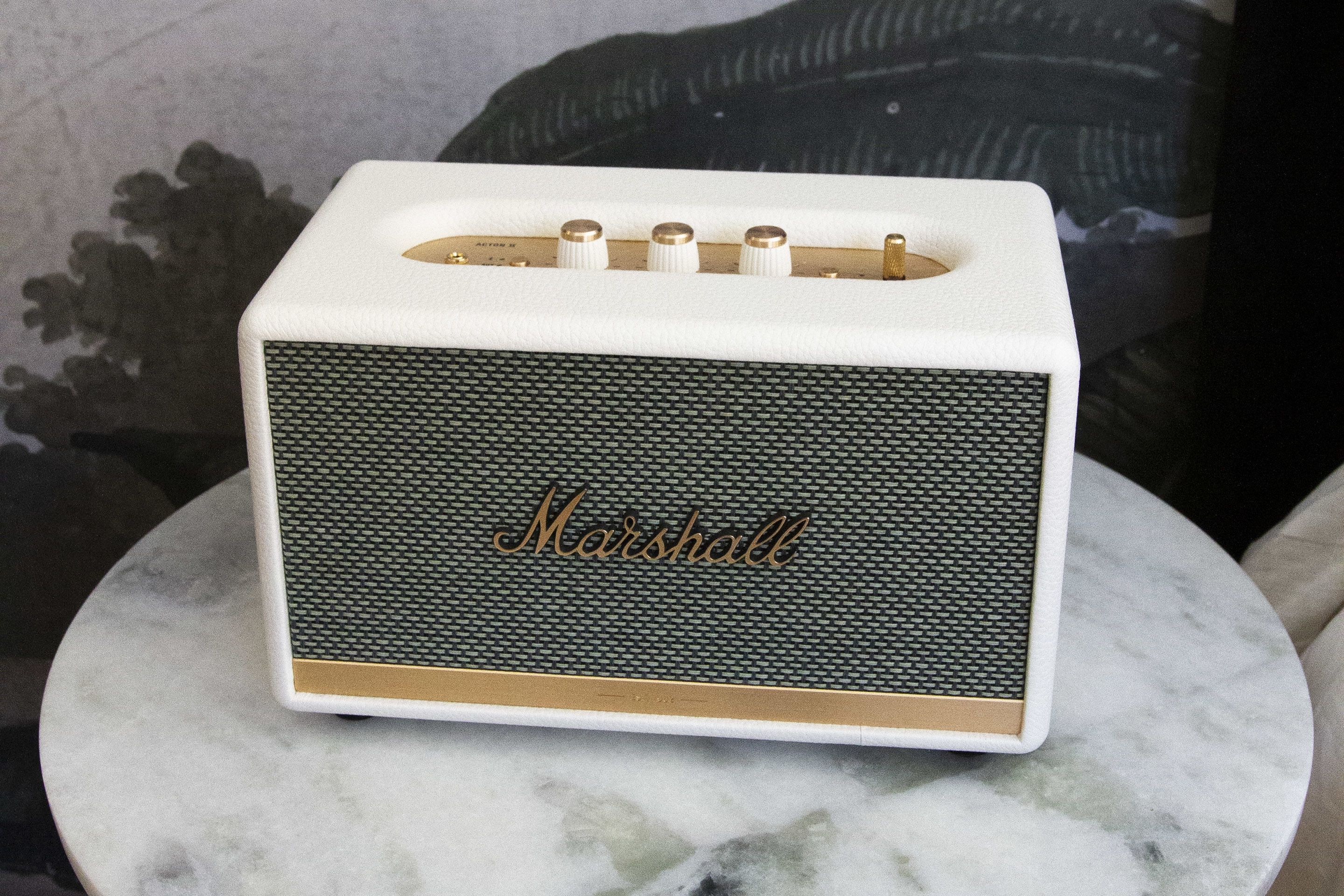 A Marshall amplifier on a marble table.