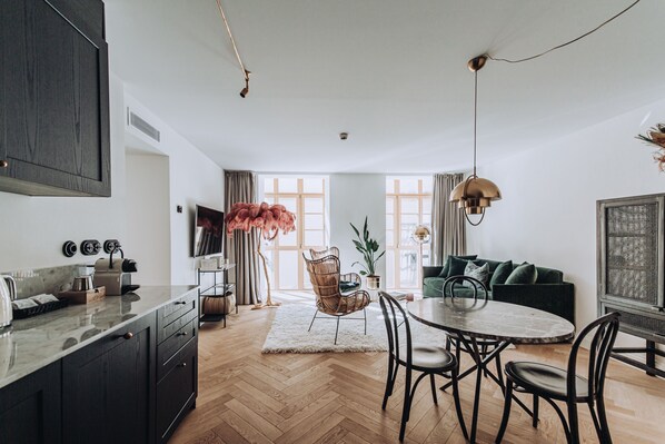 Deluxe Suite, 1 Bedroom, City View | Living area | 56-inch Smart TV with digital channels, TV, Netflix