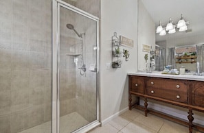 Combined shower/tub, hair dryer, towels, soap